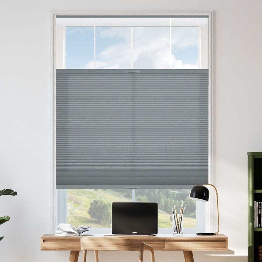 Top-down honeycomb shade providing privacy and daylight in an Ajax home